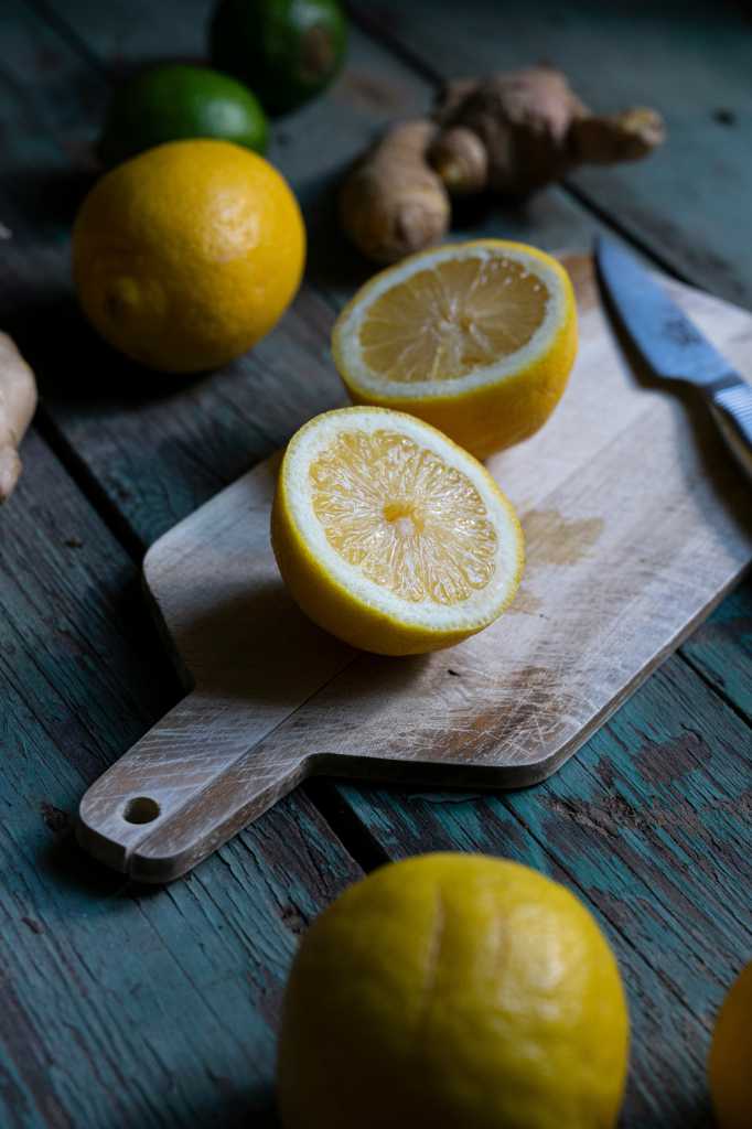 Lemons on a cutting board.